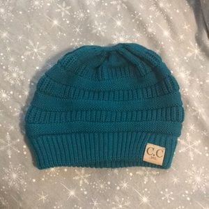 greenish teal hat